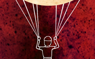 poppetje hangt aan een luchtballon